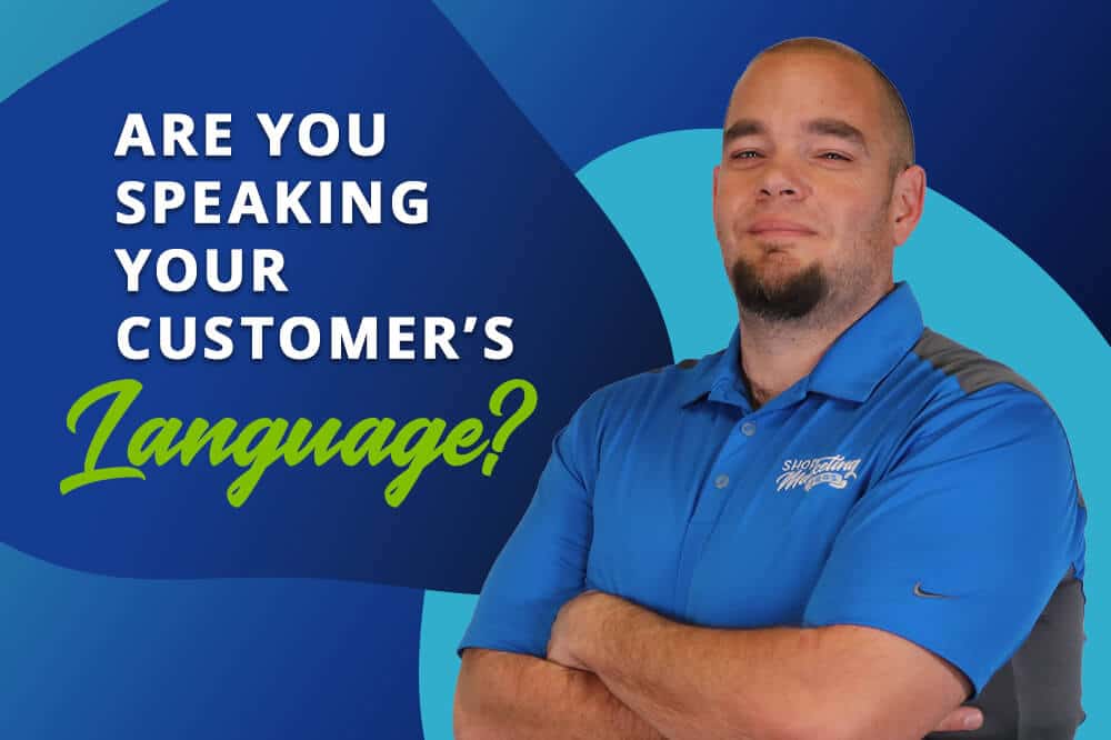 Are you speaking your customer's language? with Shop Marketing Pros in Hammond owner Brian Walker in blue polo shirt with arms crossed